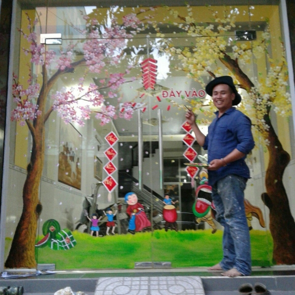 Vẽ tranh trên kính hà huy giáp quận 12